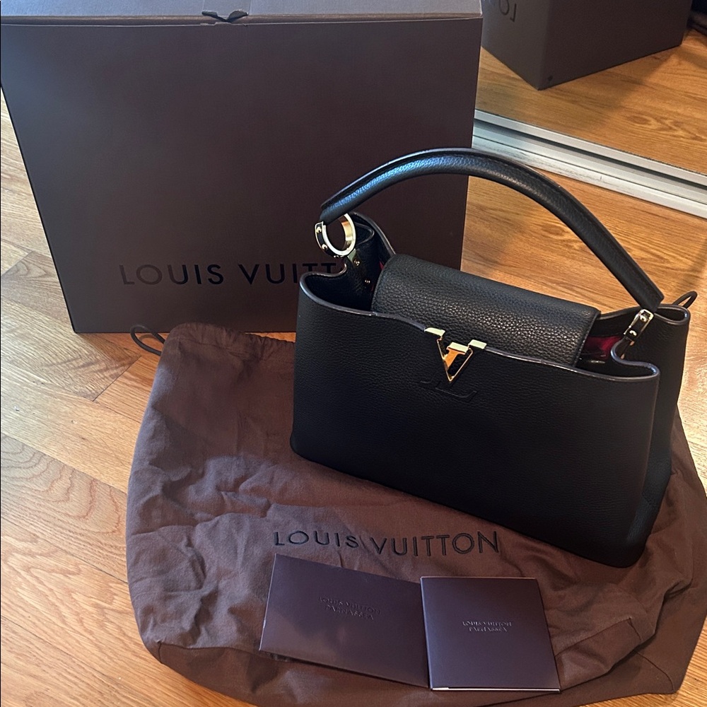 100% Authentic Louis Vuitton Capusines MM Noir Black Handbag with Gold Hardware